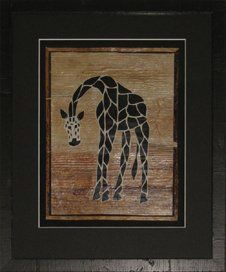 Giraffe painted on a banana leaf framed in a black olive veneer frame with black mats