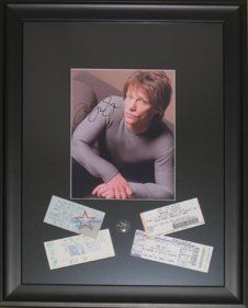 Signed Jon Bon Jovi photo, concert tickets and pin framed in a black shadow box with black mats