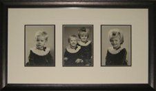 Set of 3 photos of young sisters framed in a pewter distressed frame with cream and dark grey mats