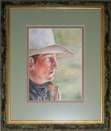 Watercolour portrait of a cowboy framed in a green & black distressed frame with green, black and brown mats