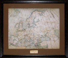 Photo Reproduction of Hand Drawn Map of Europe Photo reproduction of hand drawn map of Europe framed in a brown antique frame with a sepia mat