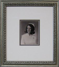 Nurse Graduation Photo Graduation photo for a nurse framed in a silver ornate frame with white and grey mats