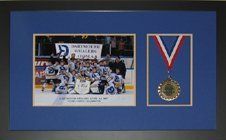 2007 Atom AA Hockey Tournament memorabilia shadow box Team photo and medal from Atom AA hockey tournament framed in a black shadow box with blue and yellow mats