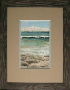 'Incoming Wave' Watercolour by V. MacLean Watercolour of waves crashing on rocks framed in a brown rustic frame with sandy and teal blue mats