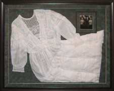 Vintage Wedding Dress Shadow Box Vintage cotton wedding dress framed in a brown beaded shadow box with green suede mats and restored photo