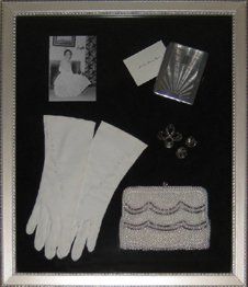 Mother's heirlooms shadow box #2 Vintage purse, gloves, earrings & brooch, cigarette case, and photo framed in a silver shadow box with black suede mats