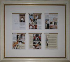Pages from an article in a wedding magazine displayed in an antique white frame with gold beaded accent and white linen mat