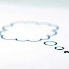 Photo of hands with pens and planning papers