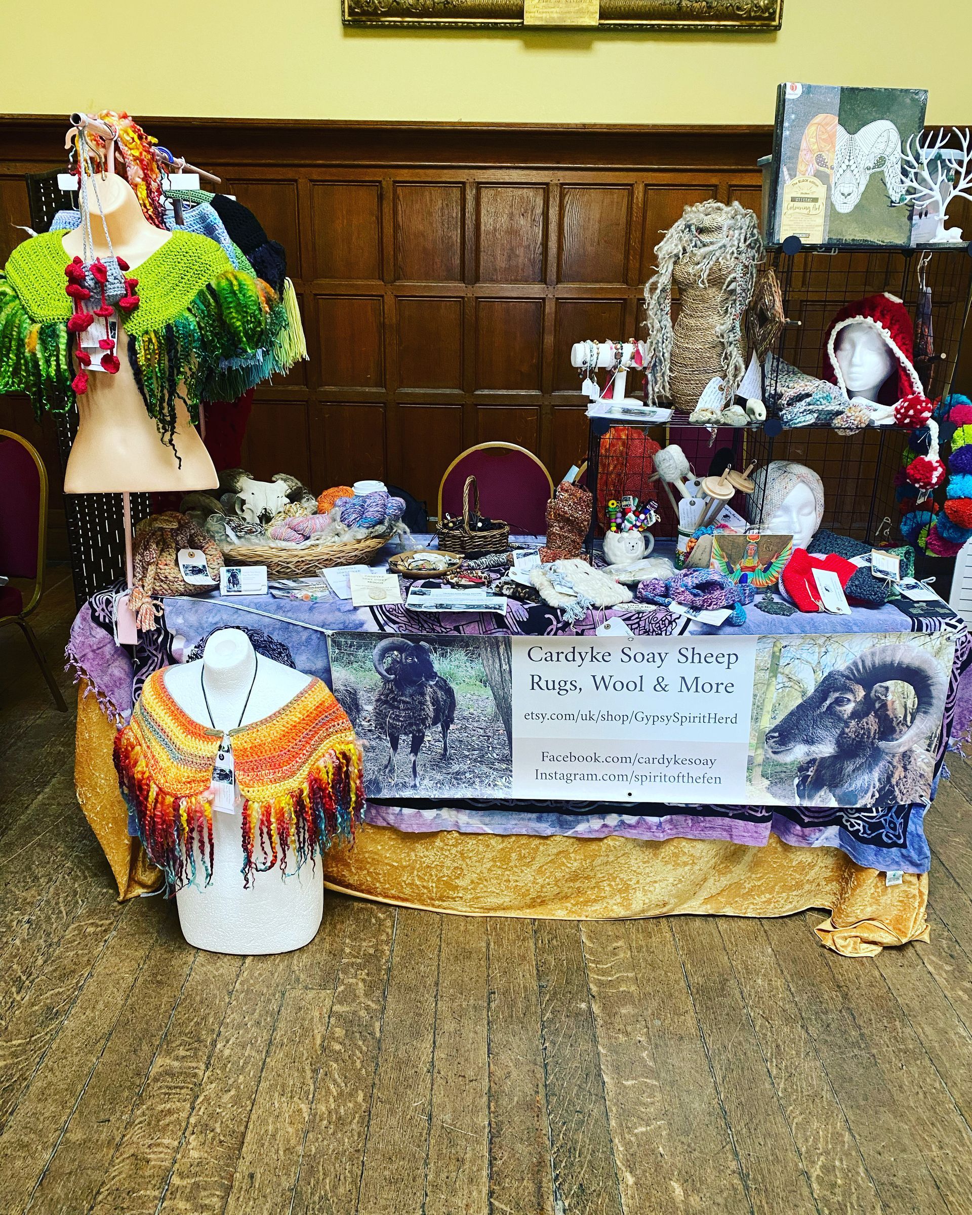 Wyrd art market stall includes folksie, pagan and weird and wonderful designs. There are statues, furry creatures, funghi themed goods and jewlery.