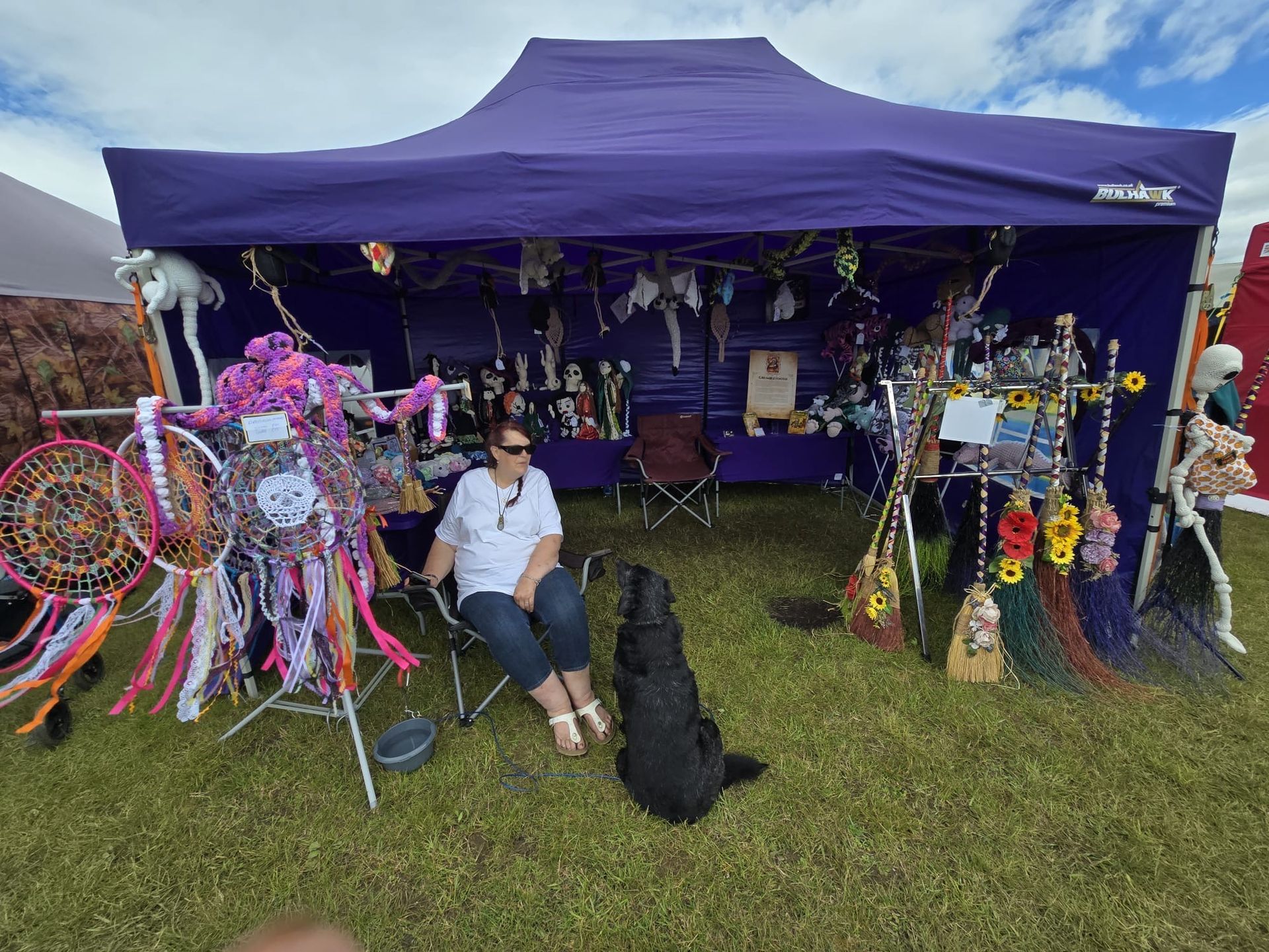 Wyrd art market stall includes folksie, pagan and weird and wonderful designs. There are statues, furry creatures, funghi themed goods and jewlery.
