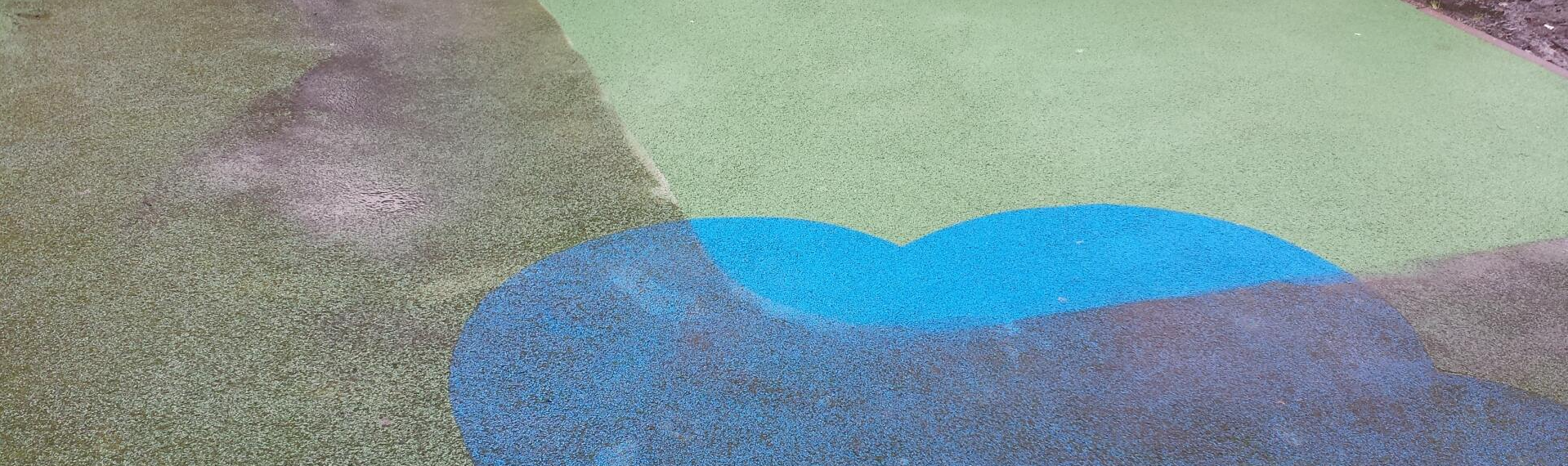 Wetpour EPDM playground surface showing before and after cleaning