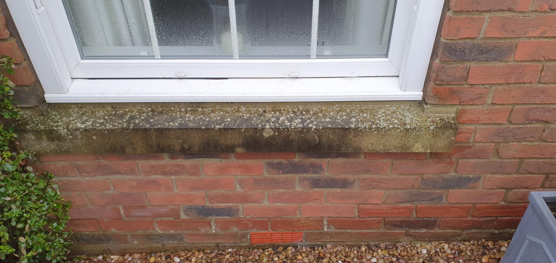 Yorkstone window sill before cleaning