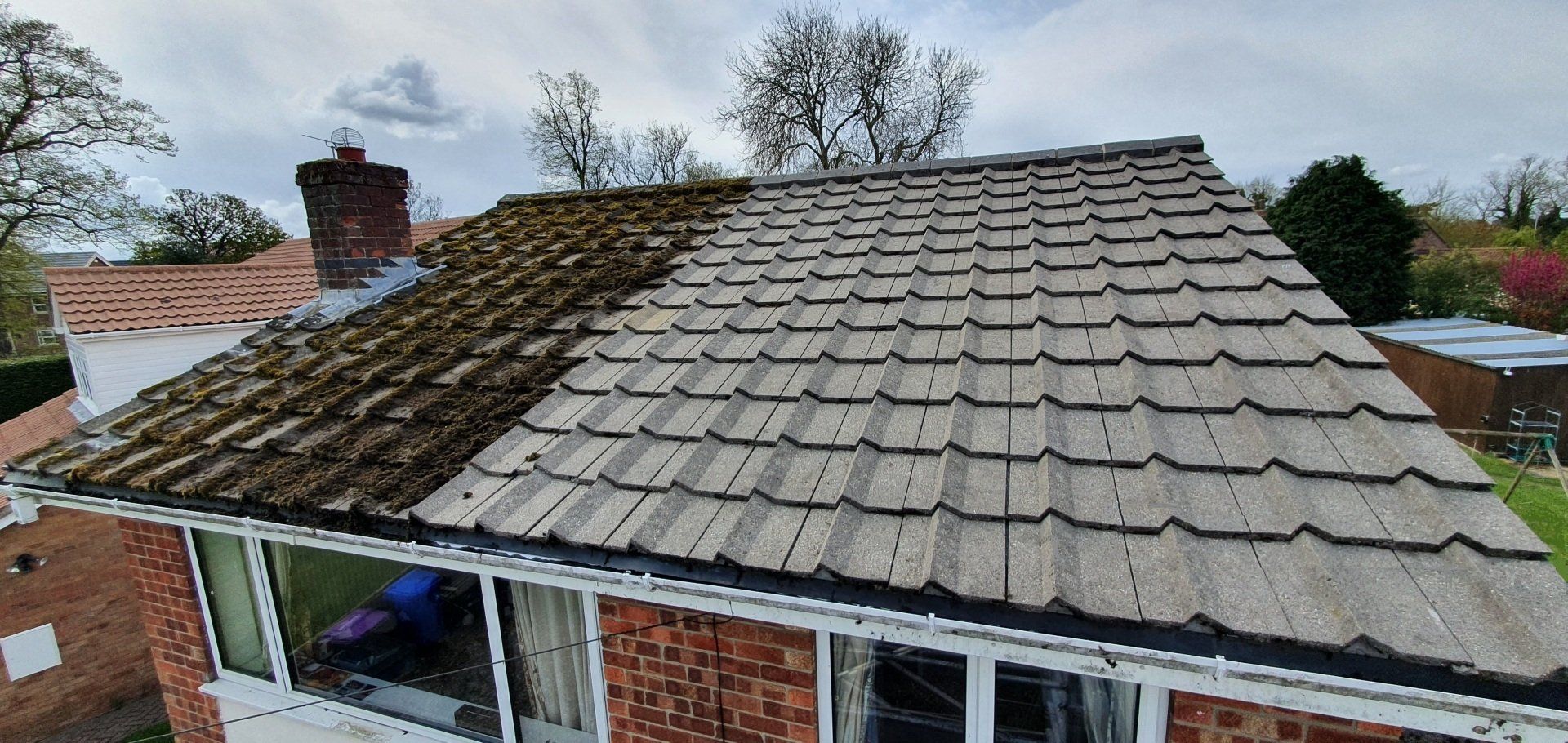 50 year old concrete roof tiles after steam cleaning