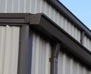Commercial gutters after moss removal and cleaning