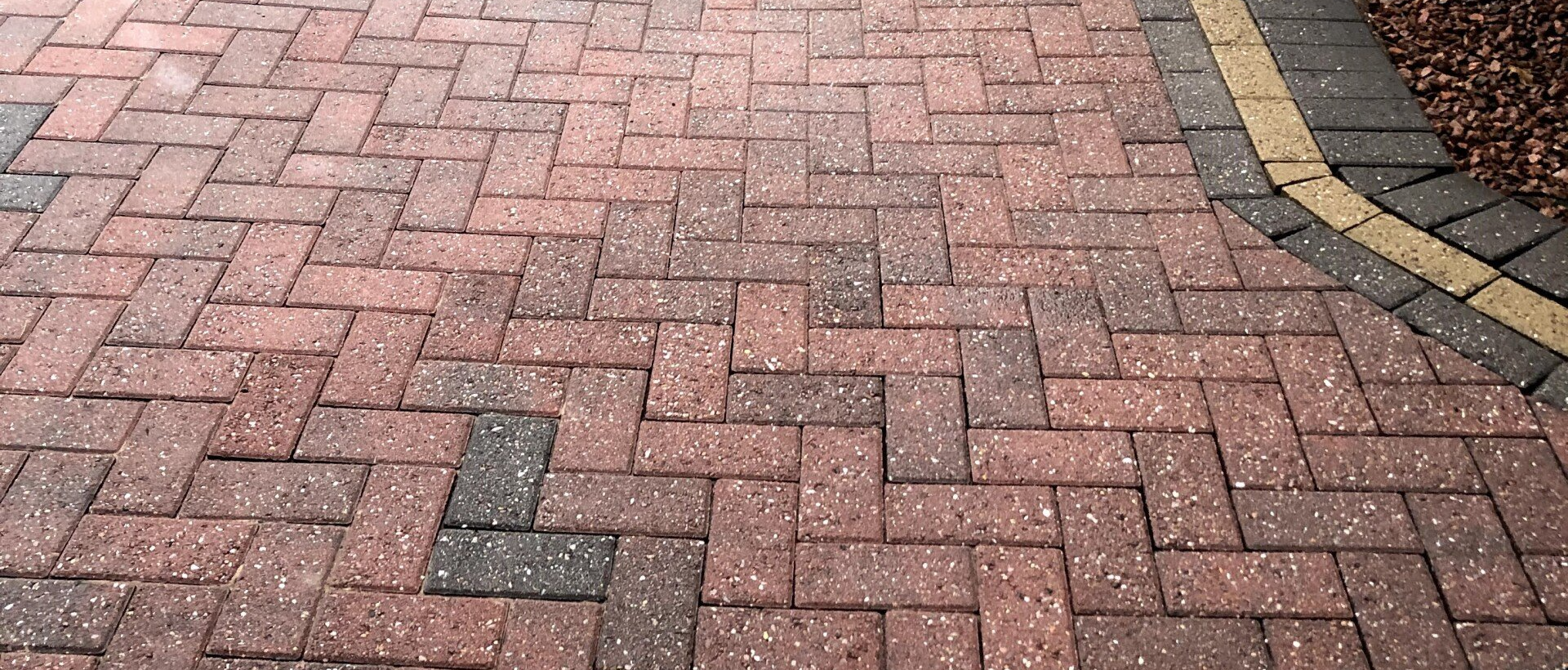 Oil stained block paving after cleaning