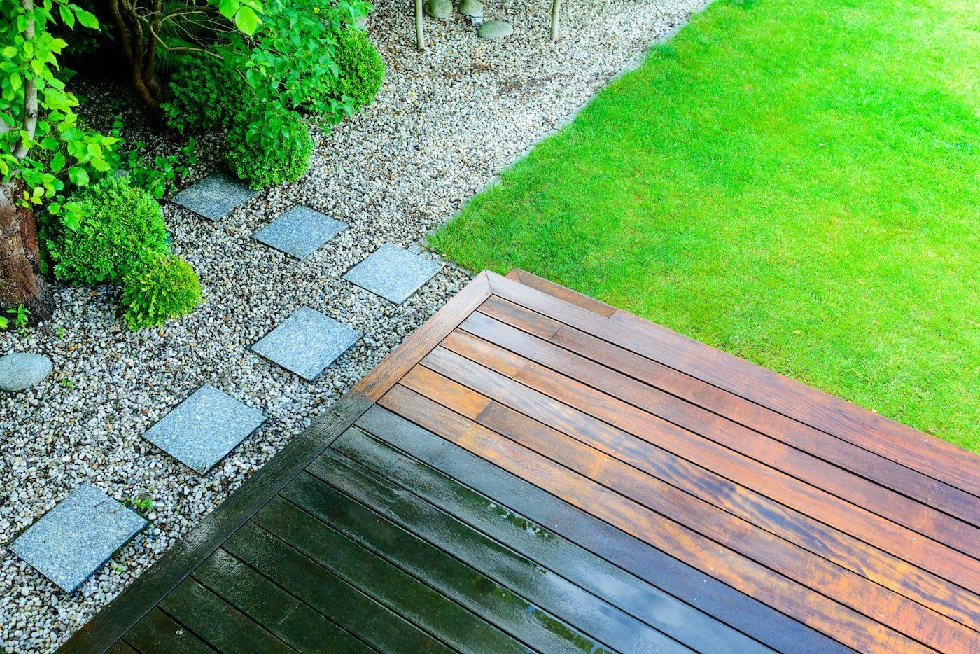 Timber decking showing before and after cleaning