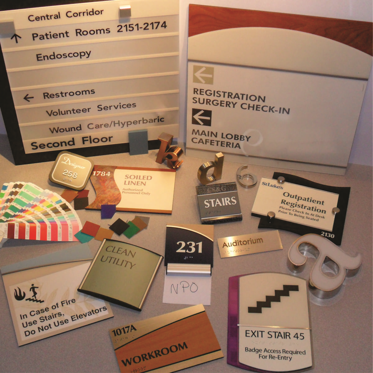 INTERIOR SIGNAGE SYSTEMS ADA COMPLIANT CUSTOM AND STANDARD