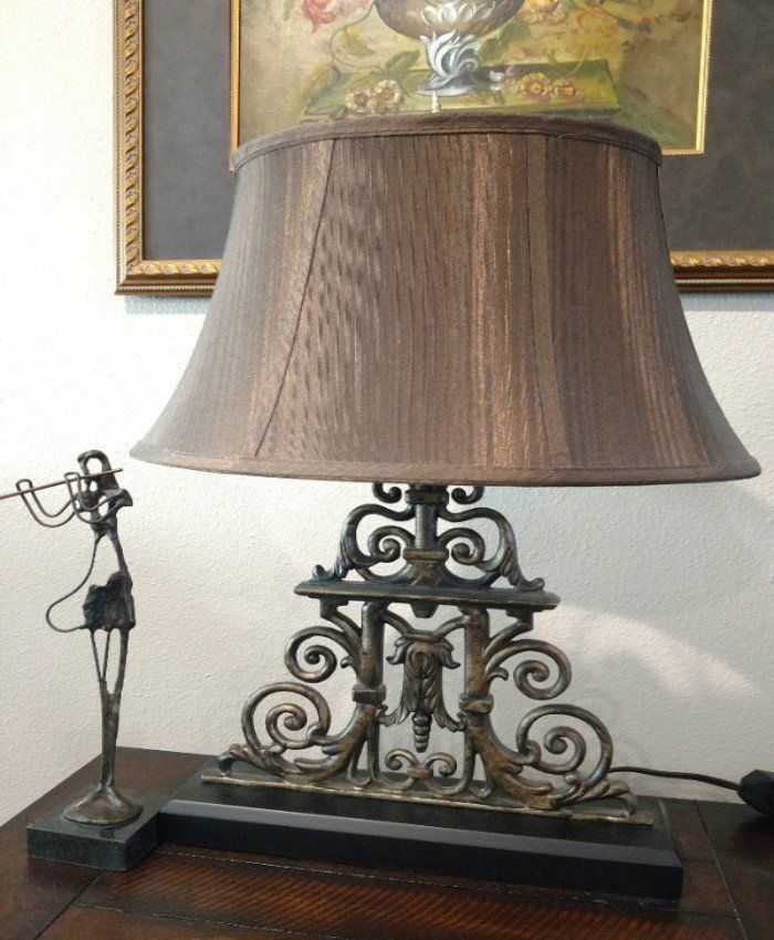 Ornate lamp in black and gold.