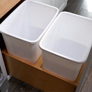 Ideal cabinetry base cabinet with two trash cans option.