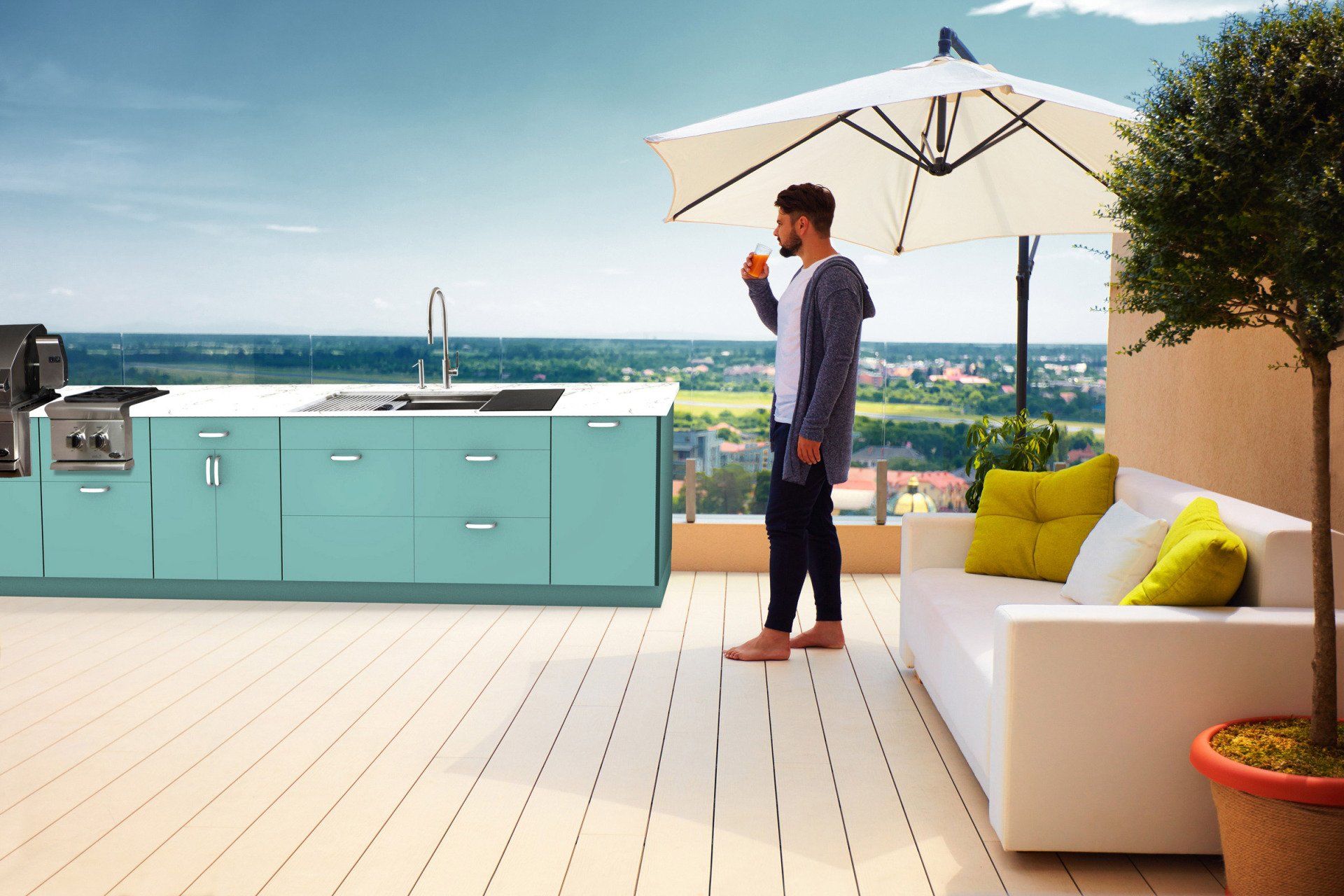 Modern green outdoor cabinetry in ocean setting.