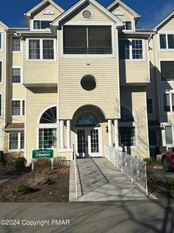 Maintenance Free living in a 55+ Community. Offering the Most Desired unit style in Labar Village !!!! Corner Unit * Two Bedrooms with Two Full Baths with Walk-in Showers * Enclosed Heated & Cooled Porch. Free Shuttle Bus Service. Garage Parking Included. Park in the underground heated Garage and take the elevator to your floor. Complete with 4x8 Storage Locker. Eat In Kitchen with Large Bay Window. Spacious Living Room and separate Dining Area. Walk-in Closet plus an additional closet in primary bedroom. Stackable Washer & Dryer. ALL exterior maintenance is included in your dues and all taken care of for you !!! Also includes Water & Sewer and Trash. Library, Game Room & Pond. Relax and enjoy easy Living with added Peace of mind having 24 Hour Security.   ASKING PRICE:  $174,900.00   PM-113527