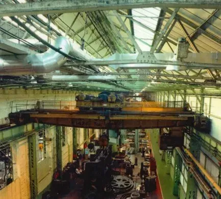 An image of a crane in a workshop before RHC refurbished it