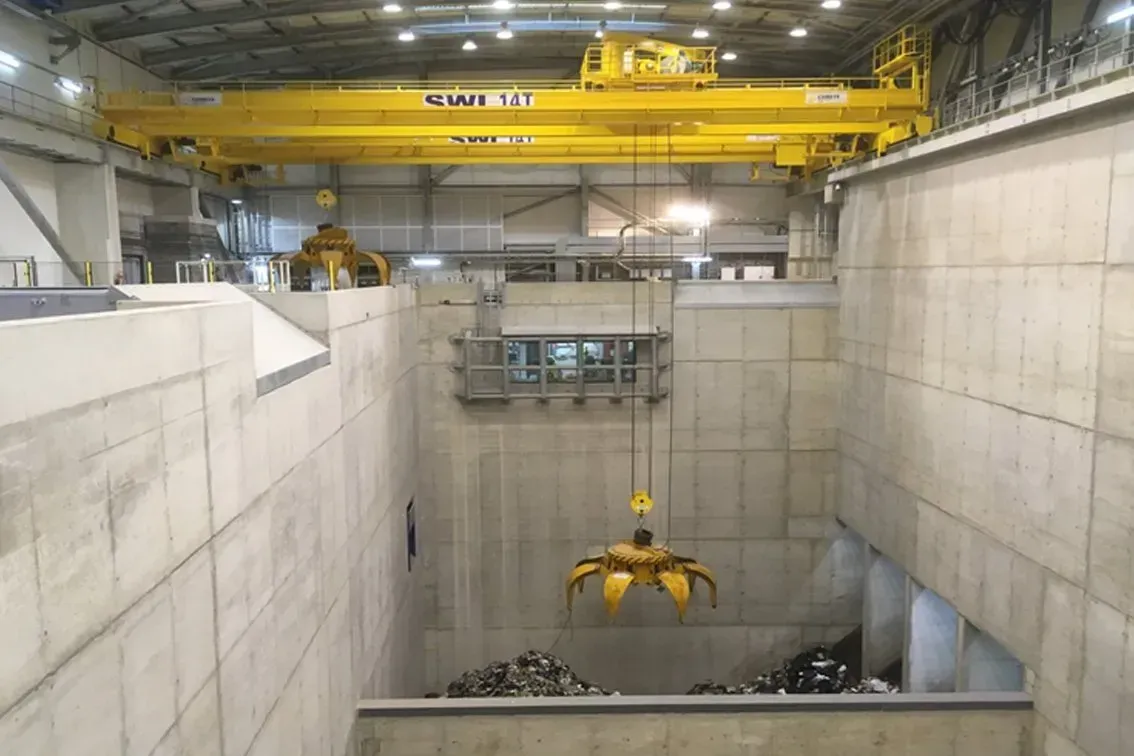A process crane in use at an energy for waste site
