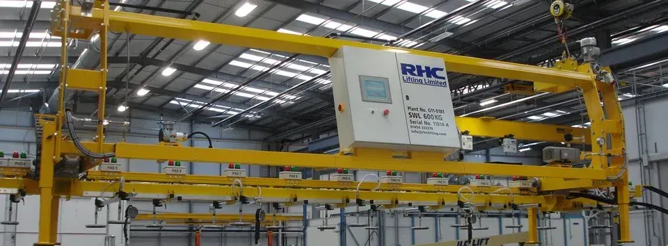 A vacuum lifting beam in a workshop