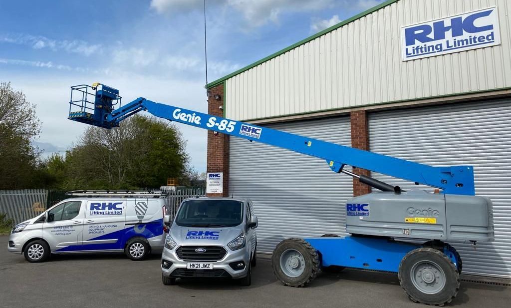 Exterior of RHC Lifting head office, with 2 RHC vans and a MEWP parked outside