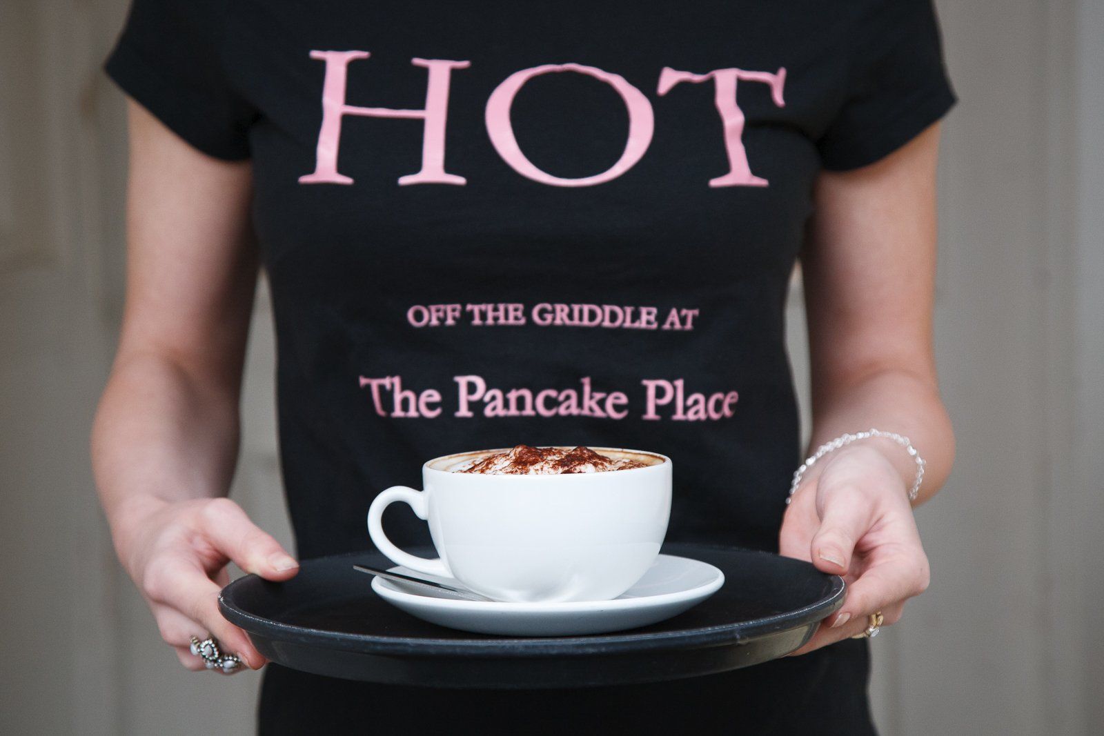 Detail of coffee cup on tray