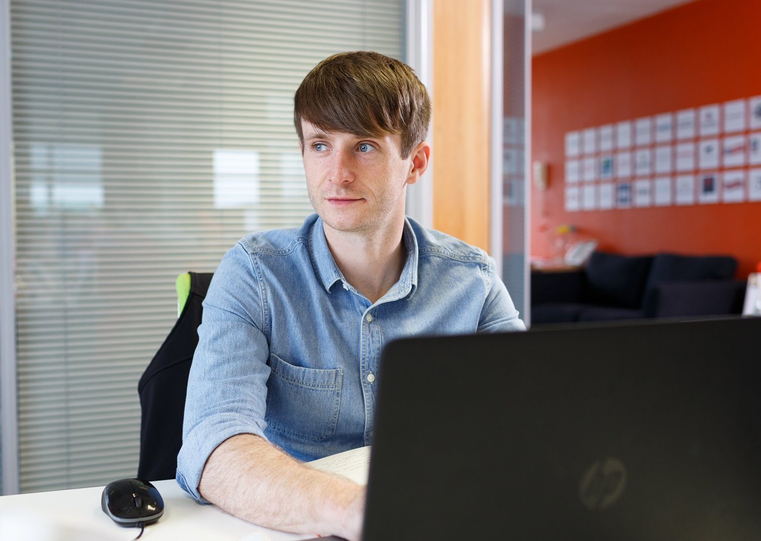 young man arty office