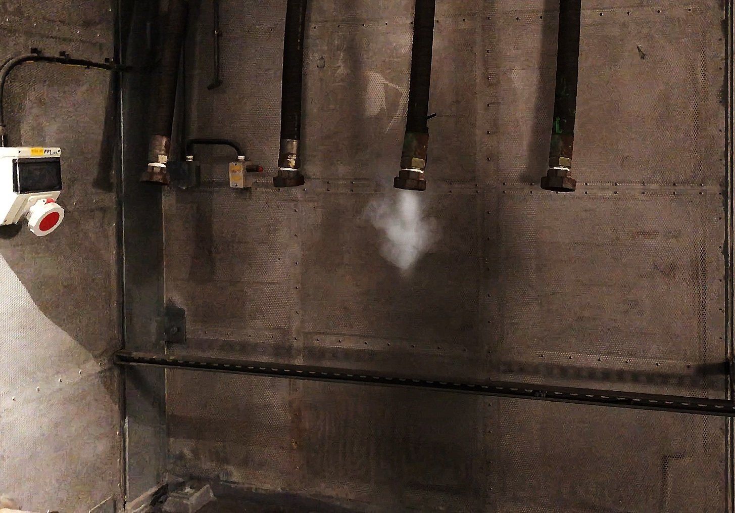 FilmSFX miniature wireless remote fog machine incorporated into set for steam or smoke effects