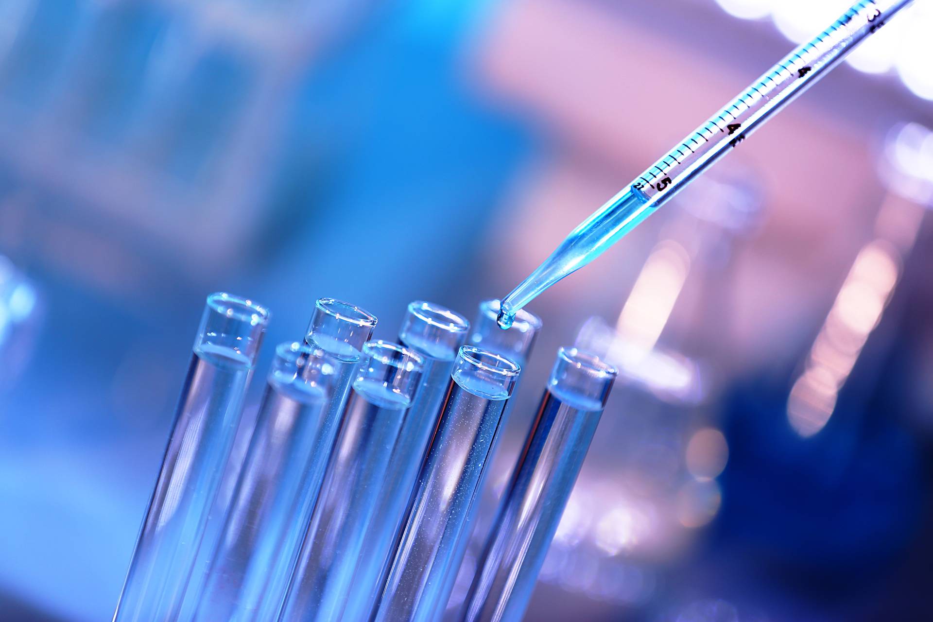 a liquid dropper releasing liquid into capsules