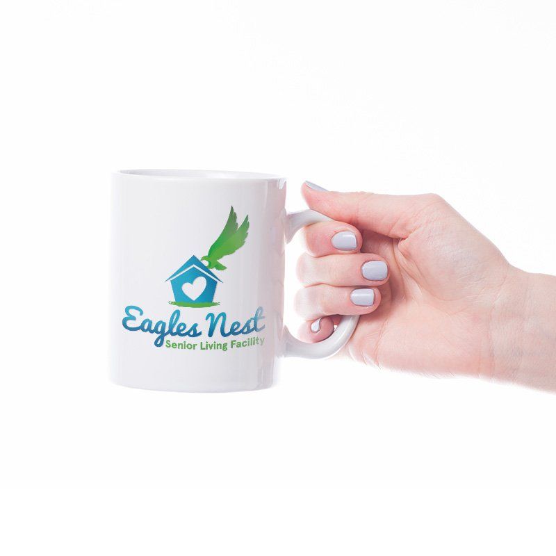 Eagles Nest Senior Living Facility Logo featured on a mug
