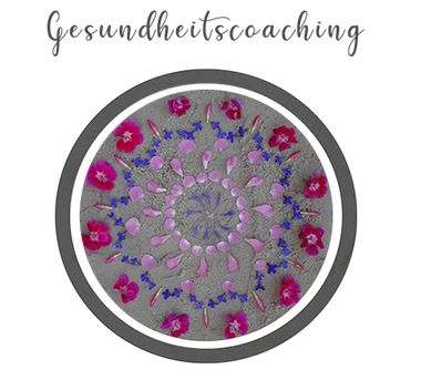 Mandala gelegt mit rosa und lila Blüten - Linkbild zu Gesundheitscoaching