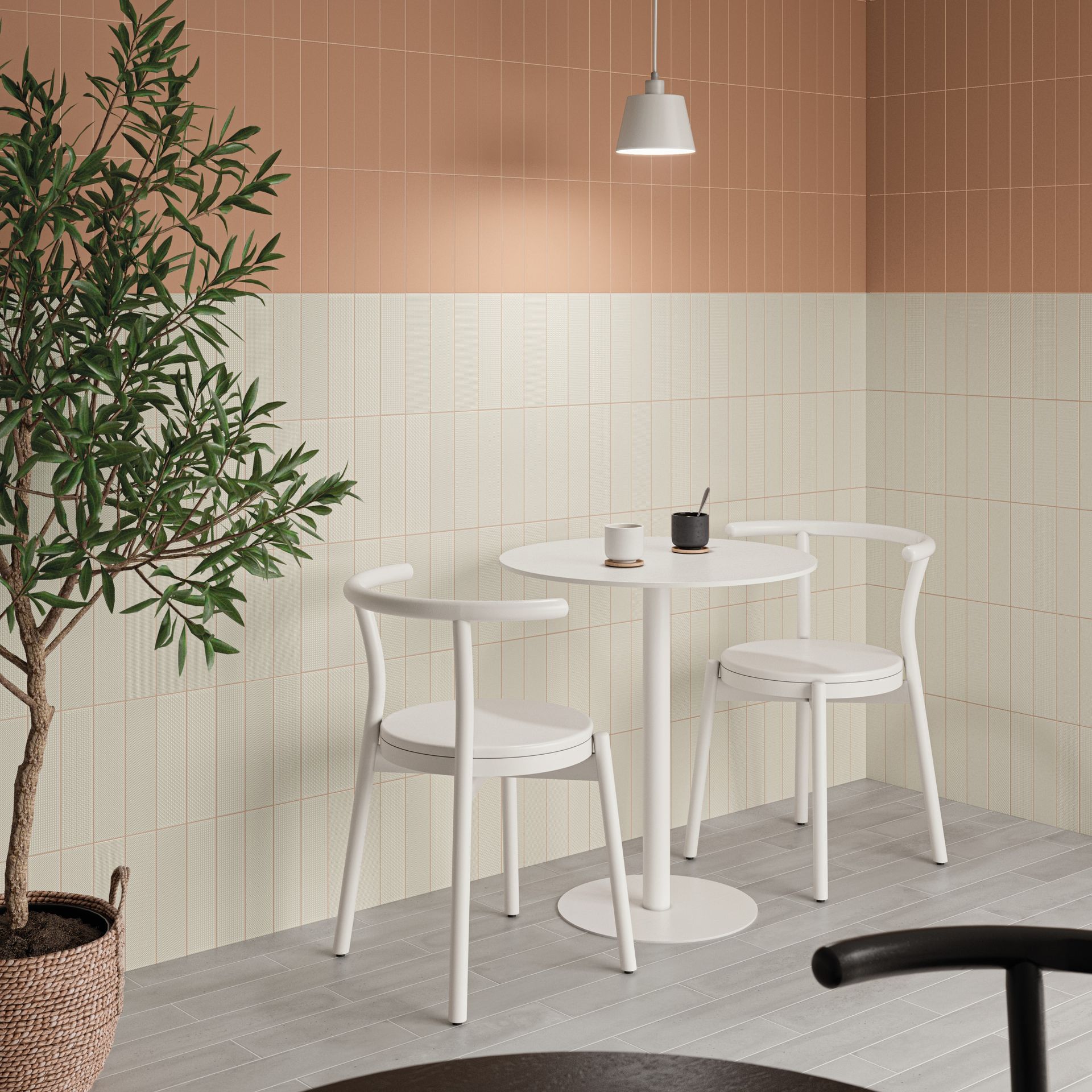 a white café design with a soft coloured tile wall with