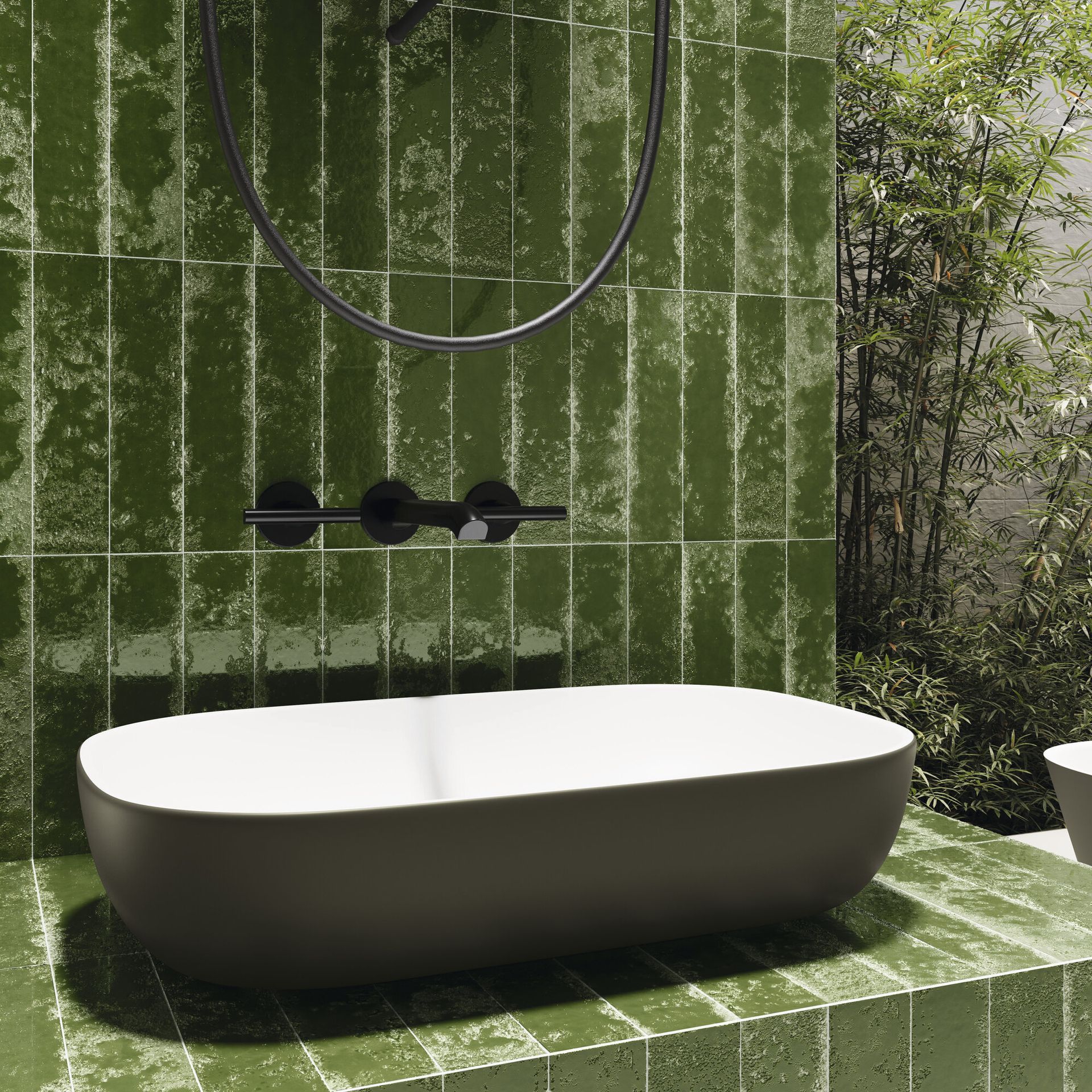 Bari crocodile green wall tiles in the bathroom with a green bath