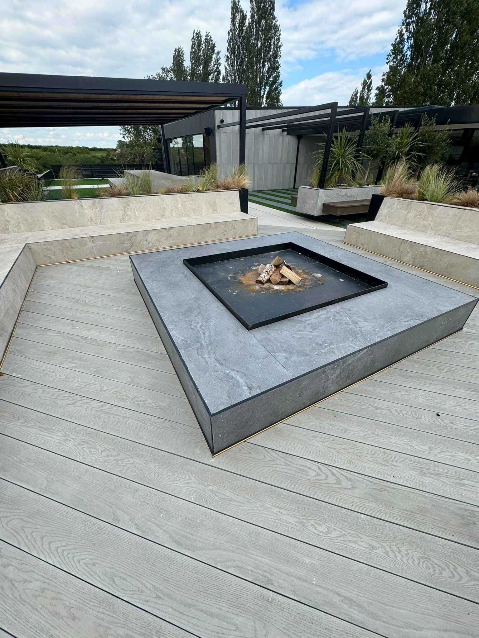 Bespoke tiled firepit in nottingham la mansion