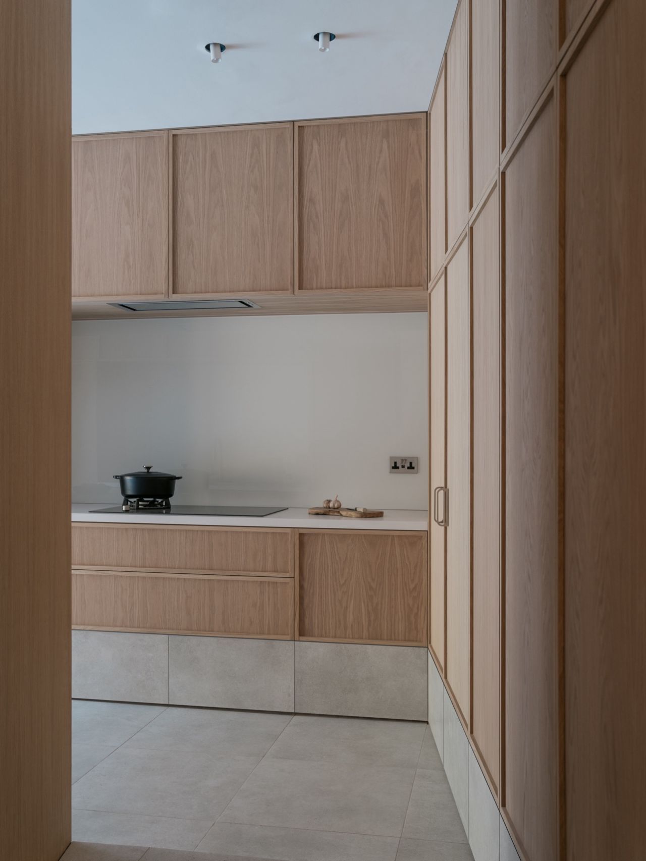 Modern kitchen design with peach coloured cupboards