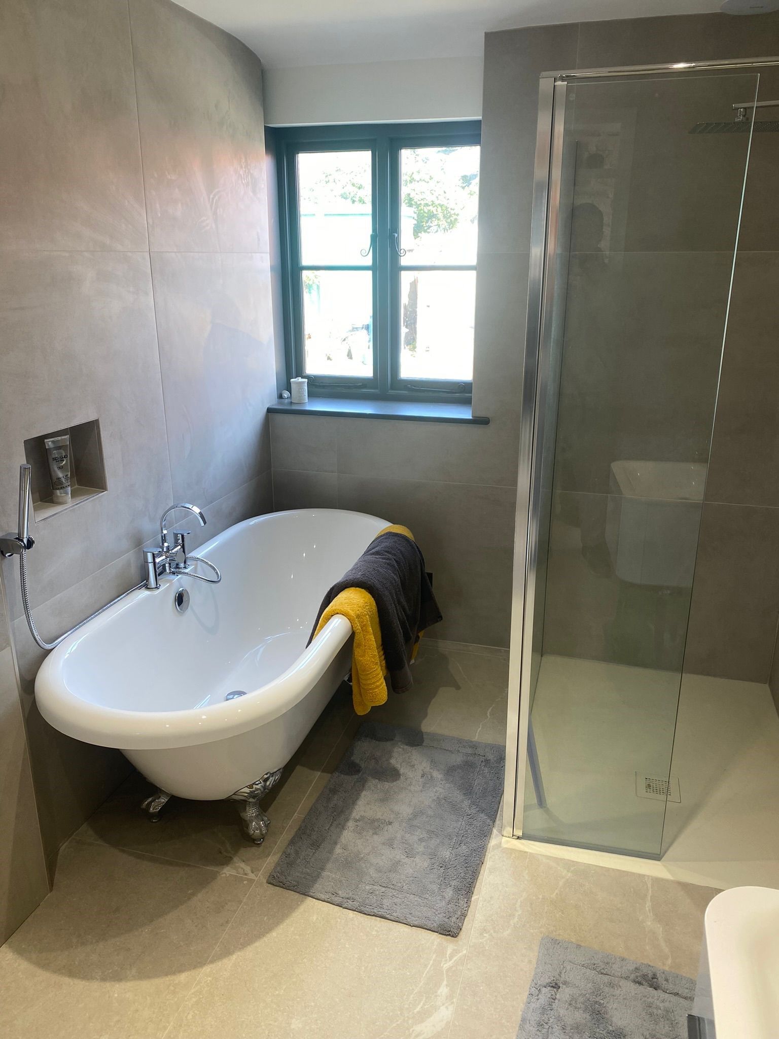 Modern bathroom designed with matt wall tiles