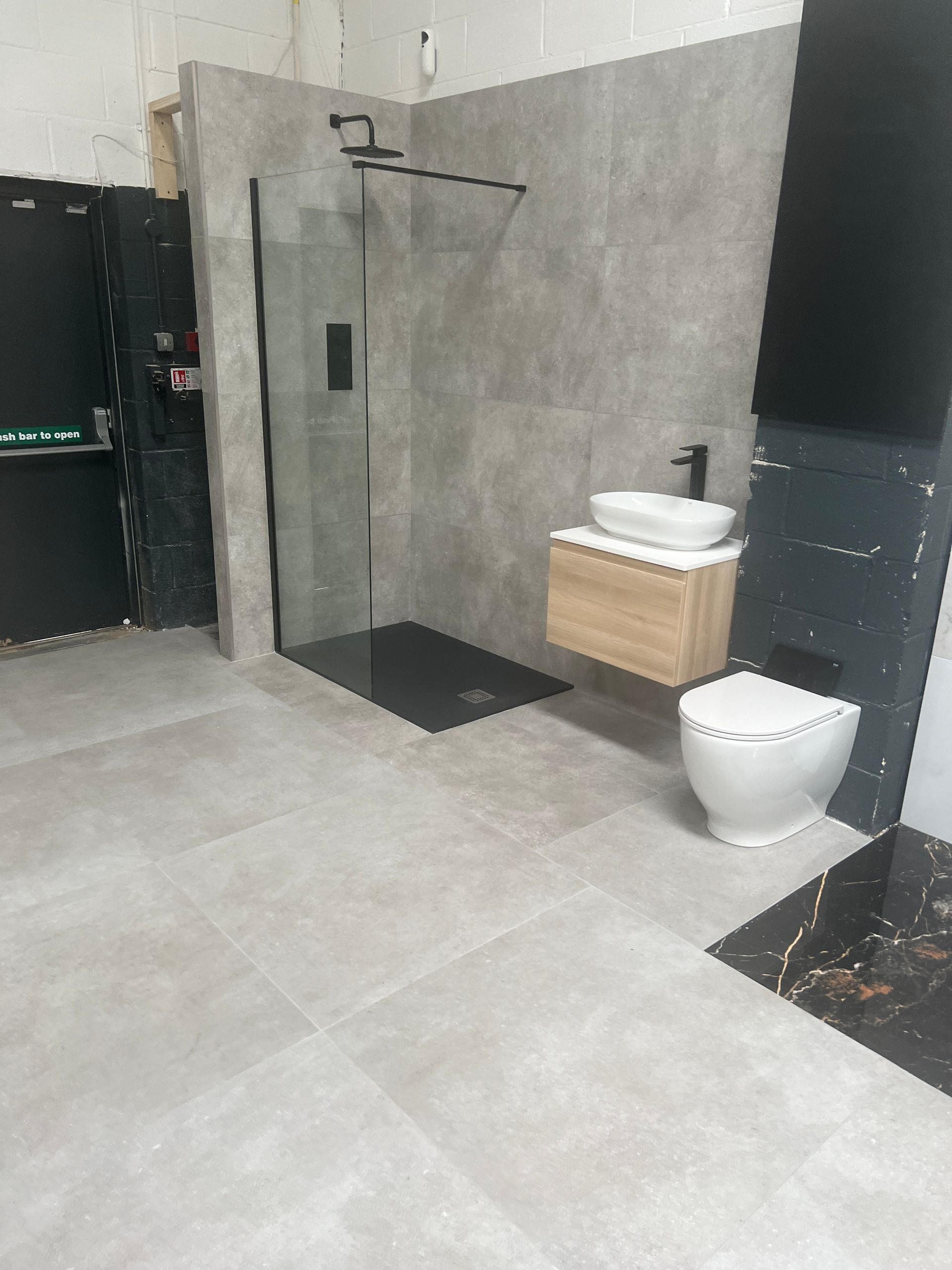 Showroom picture of standing shower design inspiration