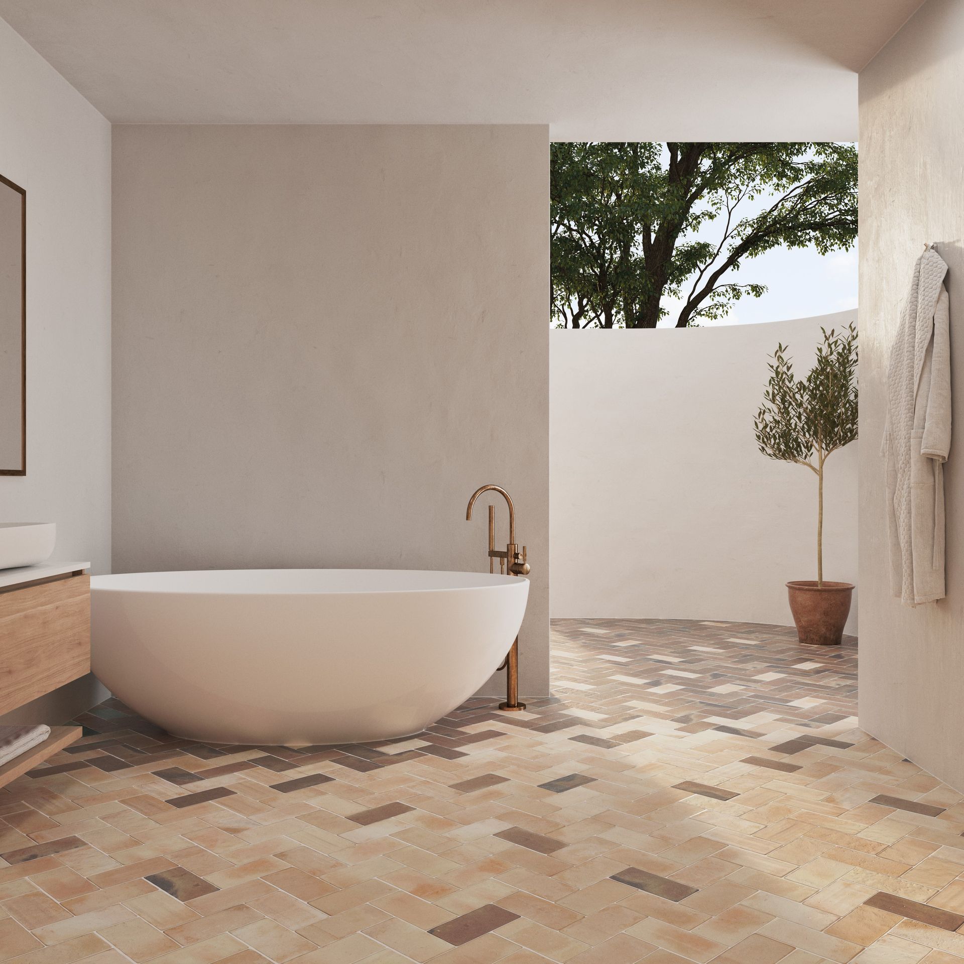 a rustic and normal effect terracotta tile used in a outside bathroom with a oval white bathtub