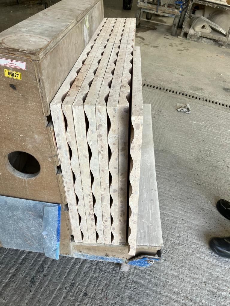 Terrazzo effect fluted tiles