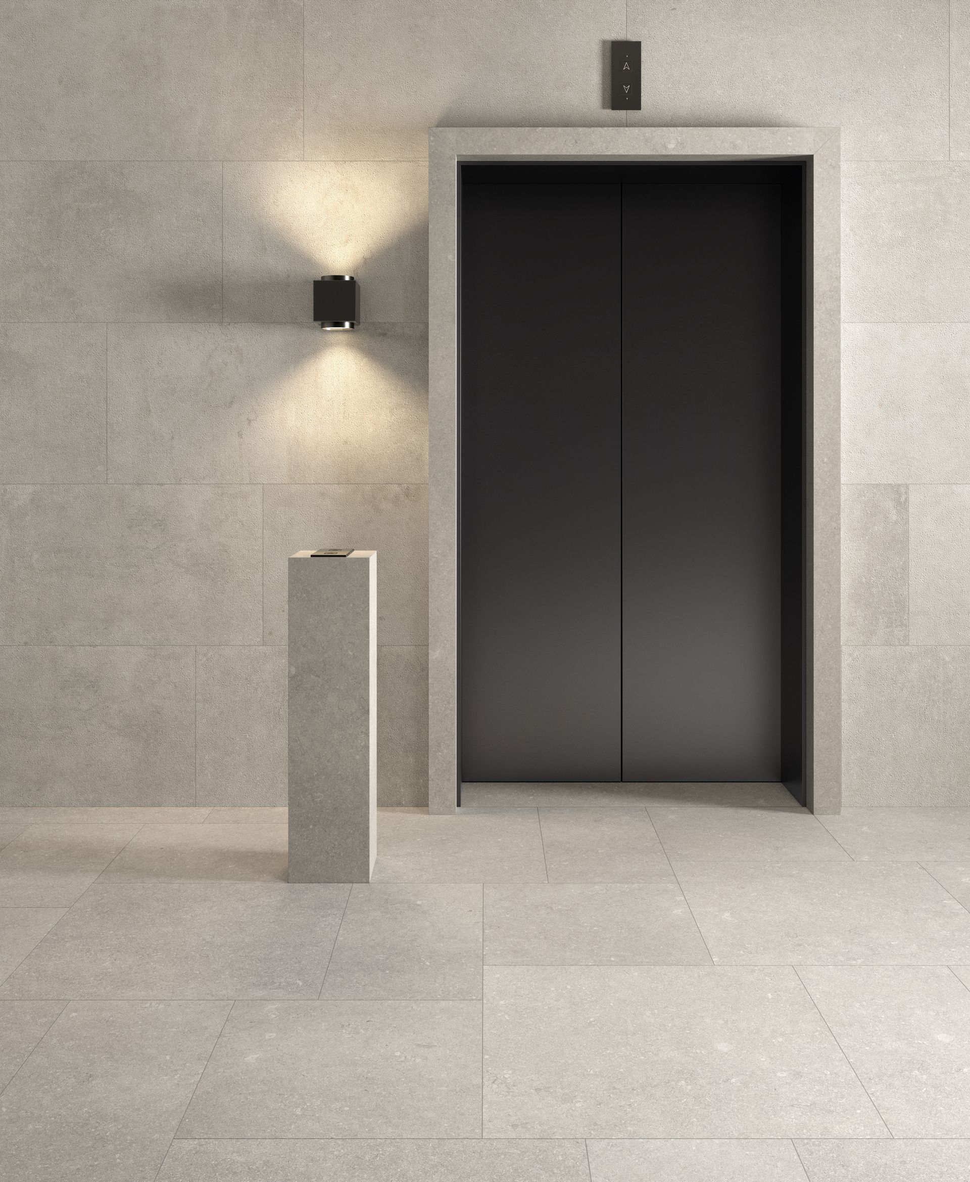 Limestone effect floor and wall tile in this empty room