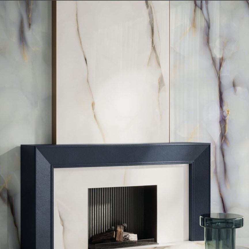 White marble dolce wall tiles used above fireplace for effect