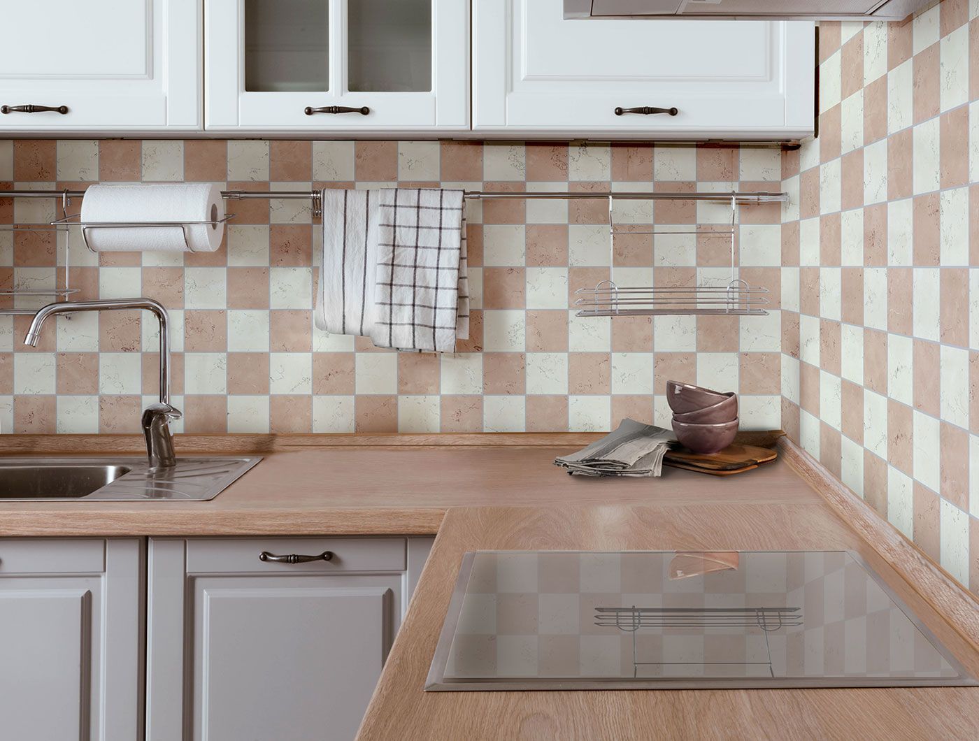 kitchen tiles making a chequerboard pattern with peach and off white square tiles