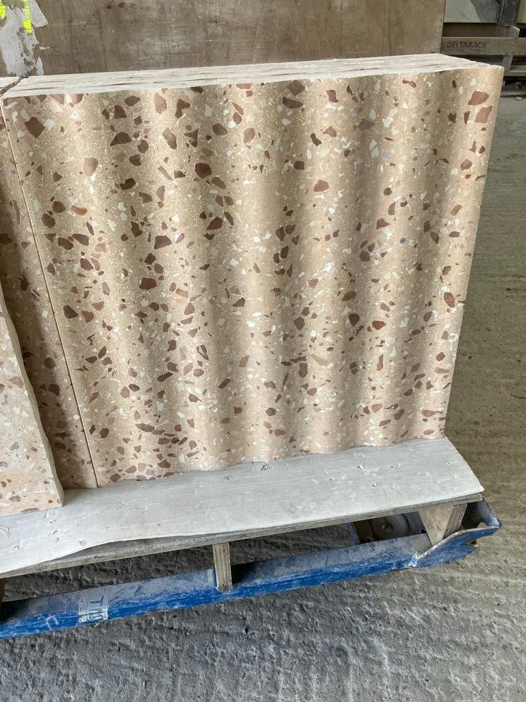 Terrazzo effect fluted tiles