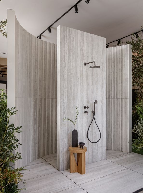 Fluted 3d blanco used to tile a showers walls