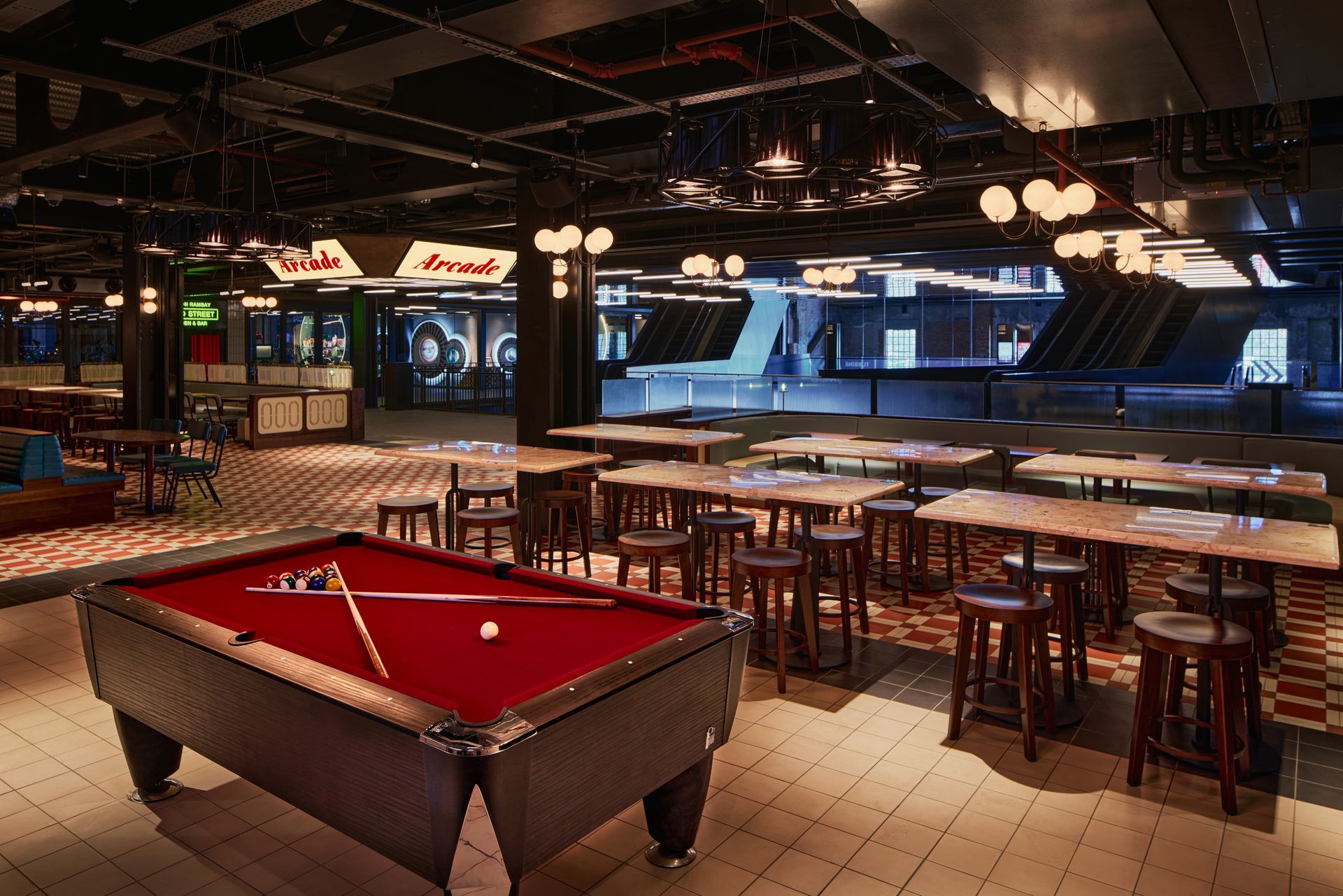 Insife the arcade food hall with square floor tiles