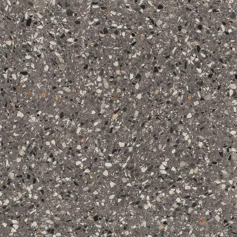 Terrazzo floor effect tile close up with white specs throughout the grey tile